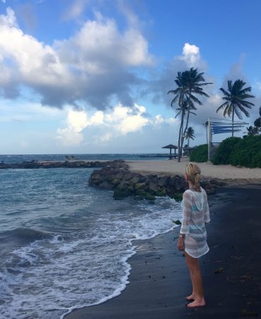 Nevis beaches -- The author at one of the islands beautiful beaches. Photo courtesy Janna Graber