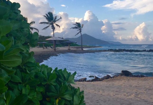 Nevis Travel - Relaxing on the beach on the island of Nevis. Photo by Janna Graber