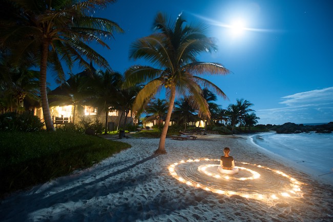 Meditation on the beach at Maya Tulum. Photo courtesy of Maya Tulum Resort