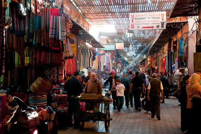 Walking through the Marrakech souk. Photo by Moroccan National Office of Tourism