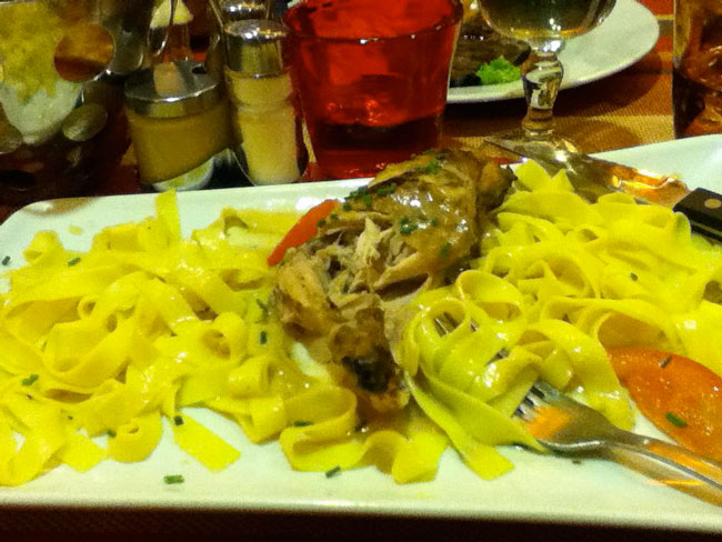 Traditional French cuisine for lunch: lapin a la moutarde, frites, and salade verte. Photo by Bruce Conklin