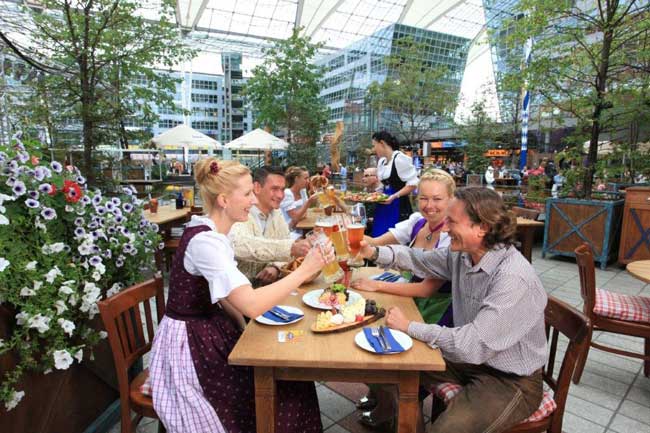 The Munich Airport has its own brewery and beer garden. During the holidays, the airport also hosts a Christmas market and ice skating rink. Photo courtesy Munich Airport 