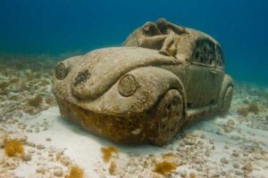 Best unusual museums - "Thing Blue," an exhibit at Museo Subacuatico de Arte near Cancun, Mexico. Photo by Jason de Caires Taylor