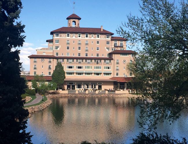 The Broadmoor main building and lake. Photo by Claudia Carbone