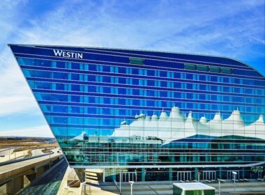 The tents of the DIA terminal are reflected in the glass windows of the Westin Hotel. Photo courtesy of Westin DIA