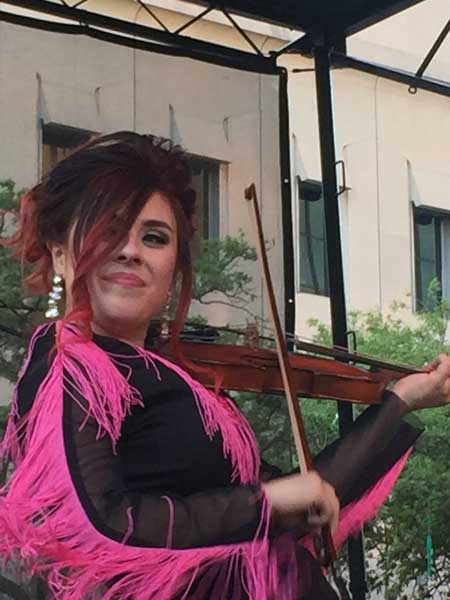 Cajun fiddler Amanda Shaw rocks at Wednesday at the Square in New Orleans. Photo by Janna Graber