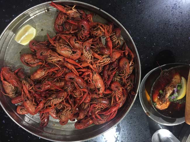 Crawfish boil at Deanie's Seafood Restaurant and Market in New Orleans. Photo by Janna Graber