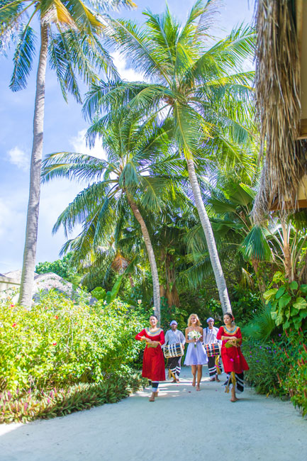 Getting married in the Maldives. A traditional Maldivian drum procession takes me through the island toward my grown. Photo by Muha Photos