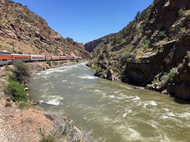 Royal Gorge RR running along the Arkansas River. Photo by Claudia Carbone