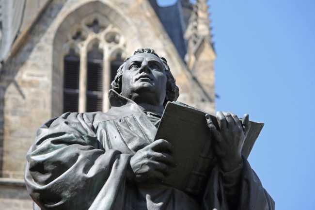 Many town squares in Germany are dominated by statues of Martin Luther. This one is in Erfurt, the city Luther called “my spiritual home,” because of his years spent there as a monk in St. Augustine’s Monastery (Photo credit: Christiane Würtenberger)