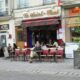 A sidewalk cafe in Marais, Paris. Photo by Victor Block