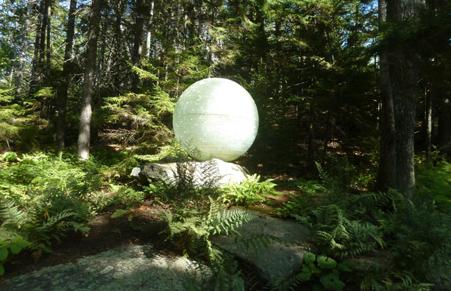 Chiseled glass orb at Coastal Maine Botanical Gardens. Photo by Michael Schuman