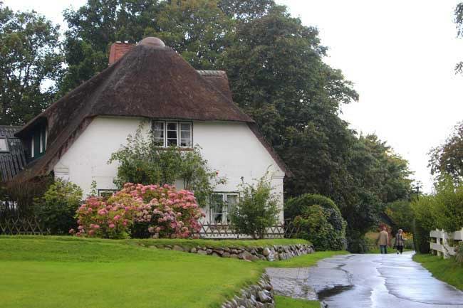 A traditional thatched roof home on the island of Sylt in Germany. Photo by Janna Graber