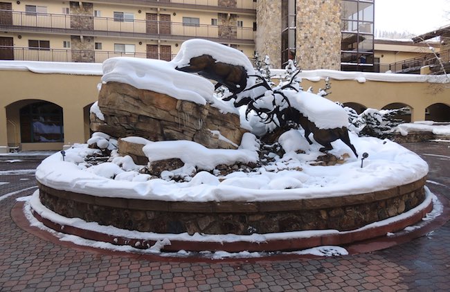 Iconic statue of two elk locking antlers in the circle drive. Photo courtesy of The Antlers