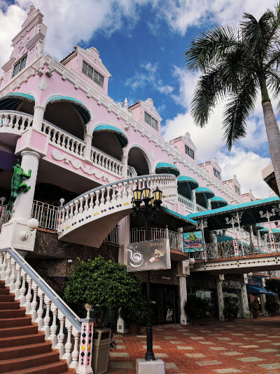 Aruba Aruba's downtown area near the Royal Plaza mall is a great shopping and eating destination amidst colorful Caribbean buildings. Photo by Kelsey Nelson