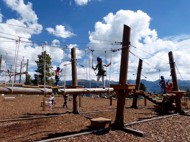 Leona balancing on the ropes course. Photo by Claudia Carbone