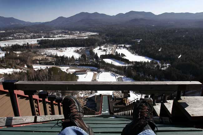 Pondering the dropoff on the 120-meter ski jump at the MacKenzie-Intervale Ski Jumping Complex outside of Lake Placid, New York. Photo by Dino Vournas