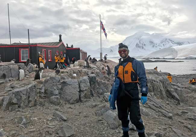 Healthy travel tips from Dr. Zhu, pictured here in Antarctica