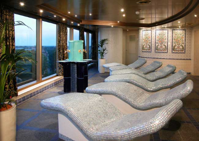 Evergreen Spa guests listen to soft music as they relax on heated lounges in the thermal suite. Photo by Holland America Line