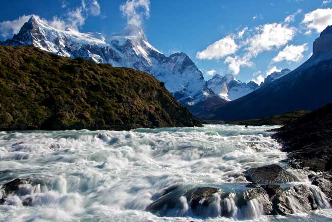 Travel in Patagonia. The Paine River flowing from the Nordenskjöld Lake towards the Salto Grande iwaterfall within the Torres del Paine National Park in Chile. Flickr/Jon Mould
