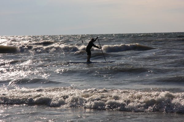 SUP on the waves of Lake Huron in Ontario. Photo by Scott Arseneault