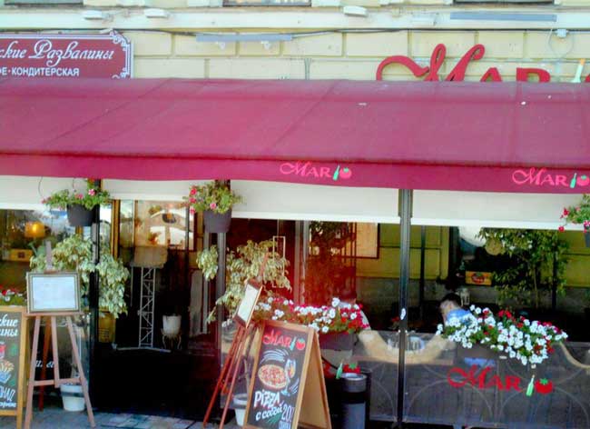 I longed to experience the cafes along the boulevards with petunia filled flower boxes. Photo by Carol L. Bownman