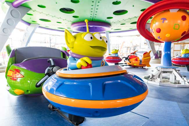 Alien Swirling Saucers spins riders in toy rocket ships. Photo by Matt Stroshane