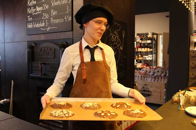 A baker at Wicklein Lebkuchen, one of Nuremberg’s most famous gingerbread makers, shows us how to make gingerbread cookies. Photo by Janna Graber