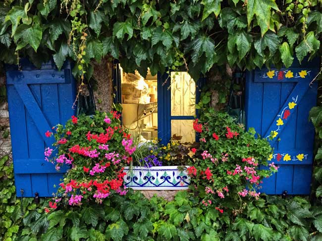 Brittany is filled with colorful flowers and charming homes. Photo by Rich Grant