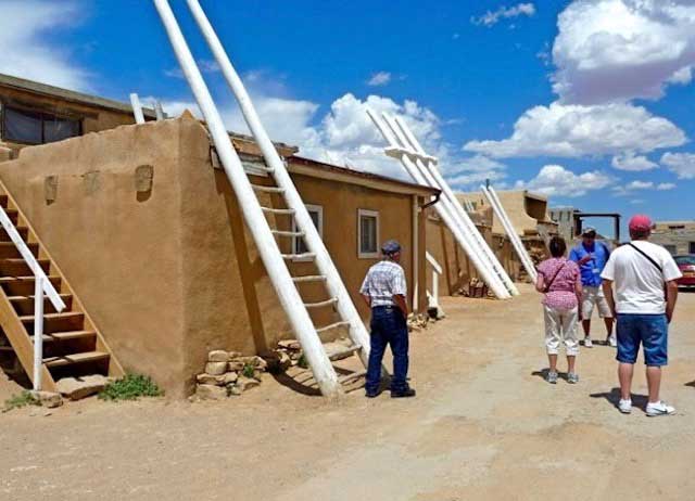 Houses with ladders in Acoma Pueblo. Photo by Claudia Carbone