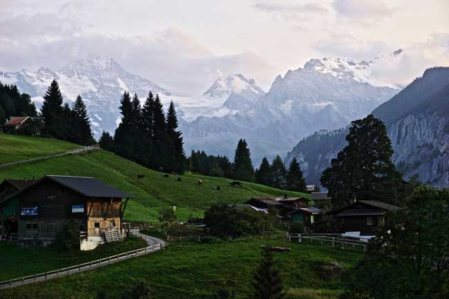 Hiking adventure in Switzerland. Watching daybreak from our terrace in Wengen