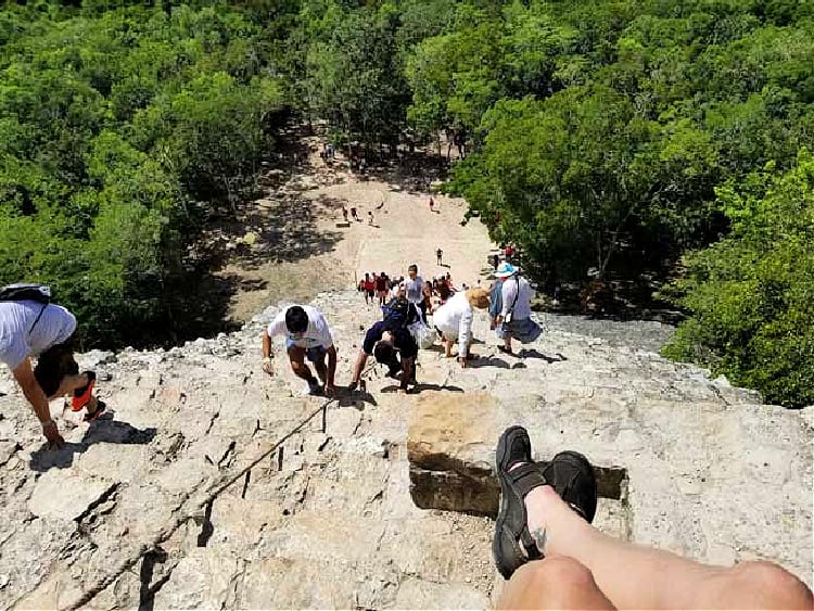 Climbing the Mayan ruins at Coba in Mexico. Photo by Carrie Dow