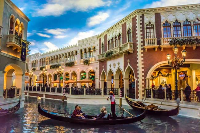 A hotel like The Venetian may seem touristy but strolling through this miniature Venice costs nothing — and the rooms are cheap as well.