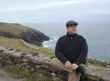 MPS sitting on a ledge overlooking the ocean.