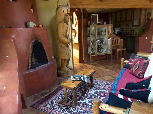 Kiva fireplace for reading. Photo by Claudia Carbone