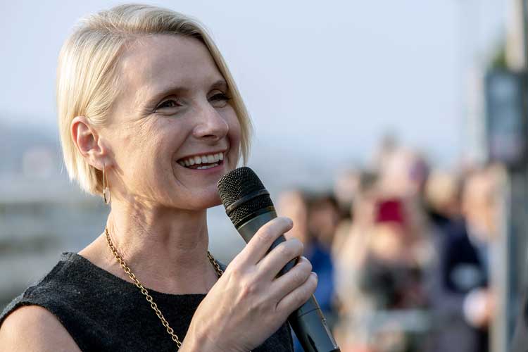 Elizabeth Gilbert, the ship's godmother, christens the Avalon Envision. Photo by Avalon Waterways