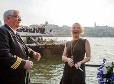 Author Elizabeth Gilbert, godmother of the Avalon Envision, laugh as she cut the ribbon with Captain Ralf Remus. Photo by Avalon Waterways