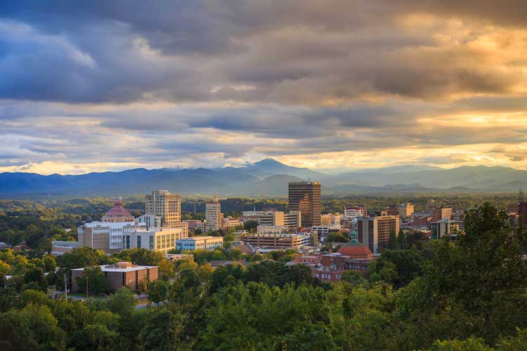 Sunset over downtown Asheville, North Carolina. Photo by ExploreAsheville.com