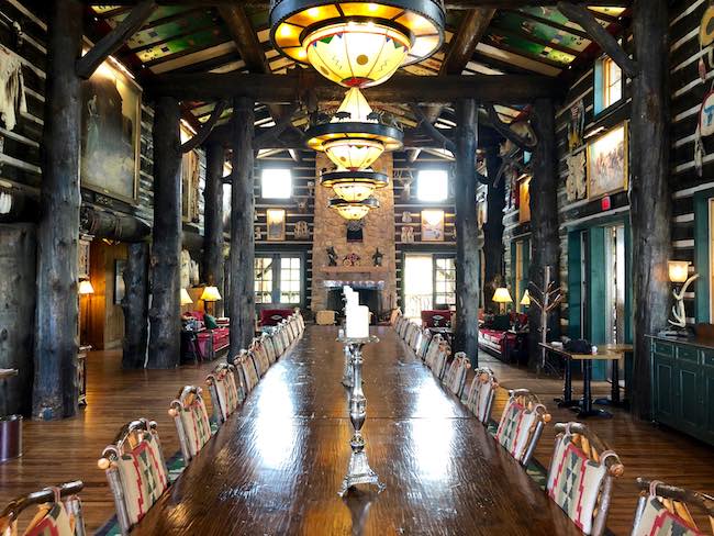 The great hall and dining table that seats 32 guests. Photo by Claudia Carbone