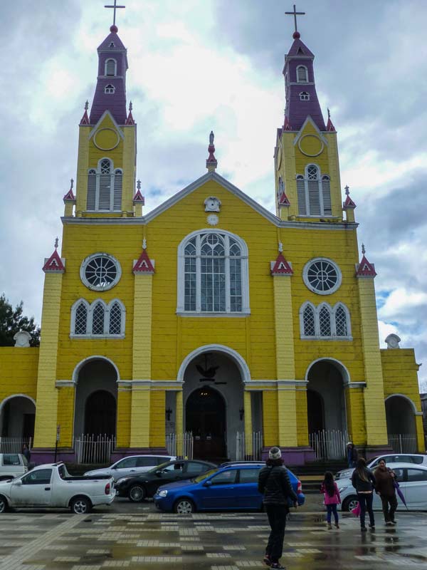 The Church of San Francisco, built by Jesuits and local shipbuilders, combines Europe’s Neo-Gothic style with shipbuilding techniques. Many of these churches are designated UNESCO World Heritage Sites, Chiloé, Chile