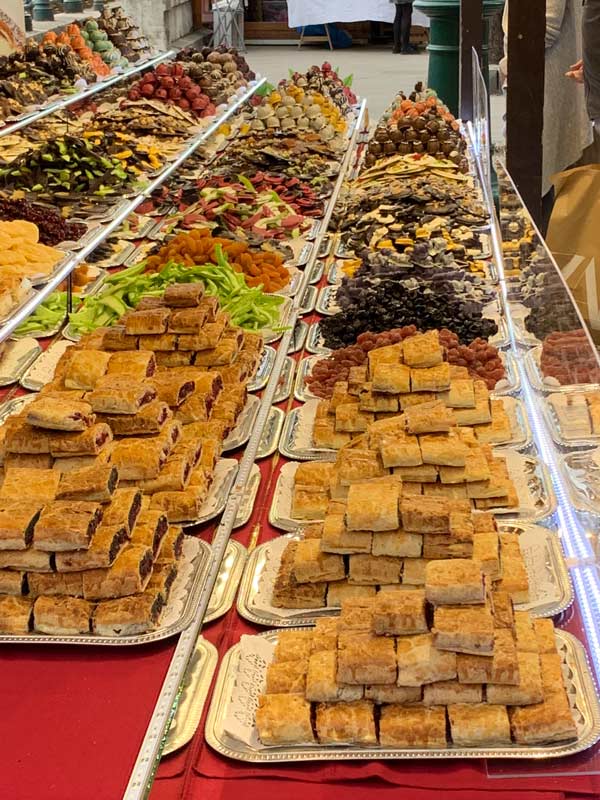 Look at pastries during a food tour in Budapest. Photo by Janna Graber
