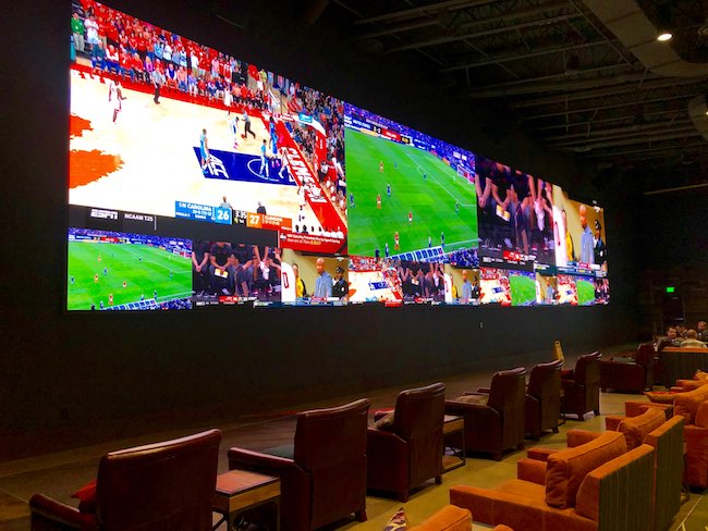 Mountain Pass Sports Bar with a 75-foot TV. Photo by Claudia Carbone