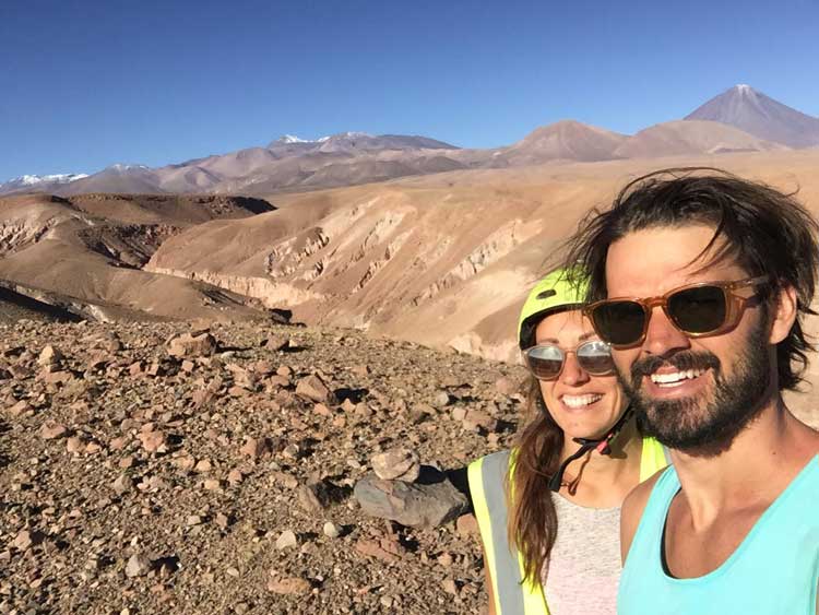 The author and her husband riding in the Atacama Desert