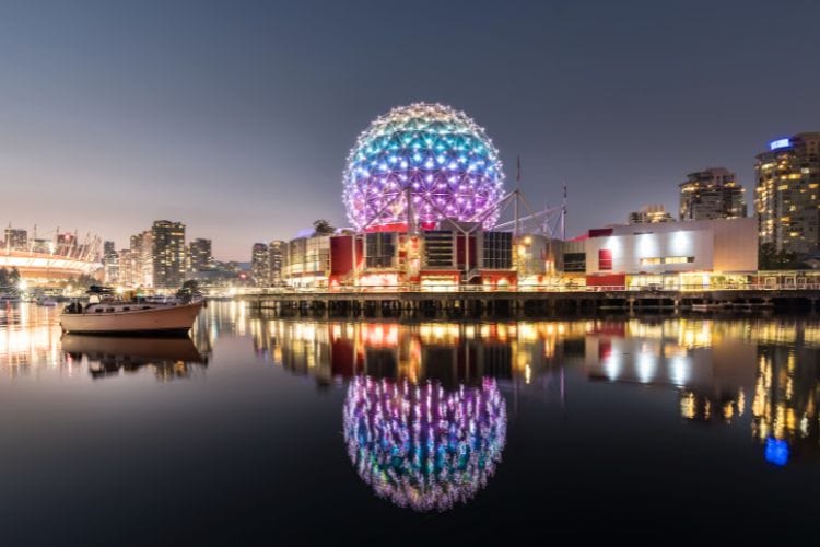 Science World lights up at night.