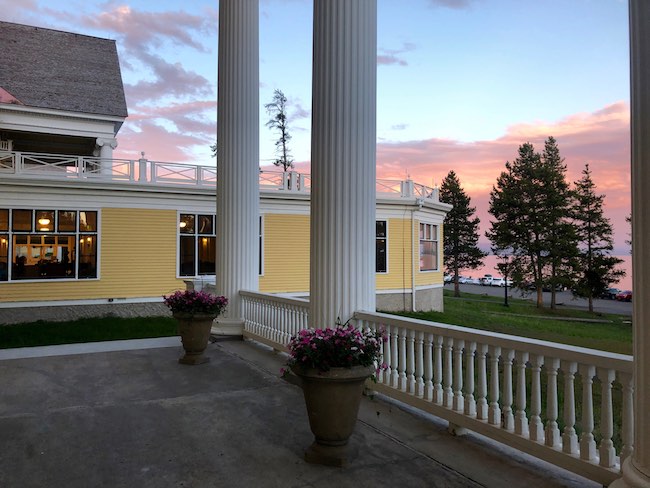 Lake Yellowstone Hotel veranda at sunset. Photo by Claudia Carbone