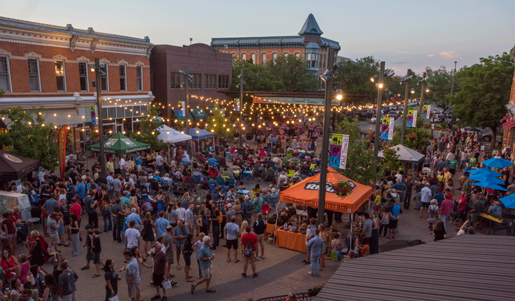 Friends and families gather for Downtown Sessions Concert Series, one of the many entertaining events held in Old Town Square. Photo by Richard Haro.