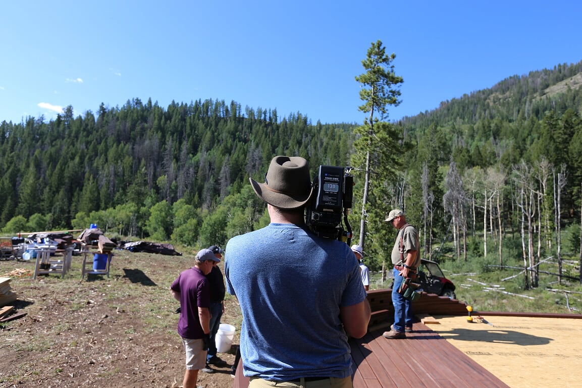 Filming on set wearing a Tenth Street Hat