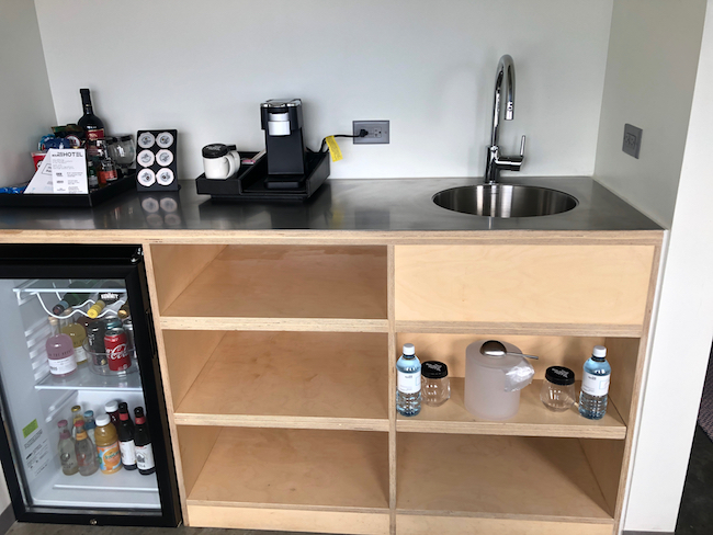 Mini bar and coffee maker. Photo by Claudia Carbone