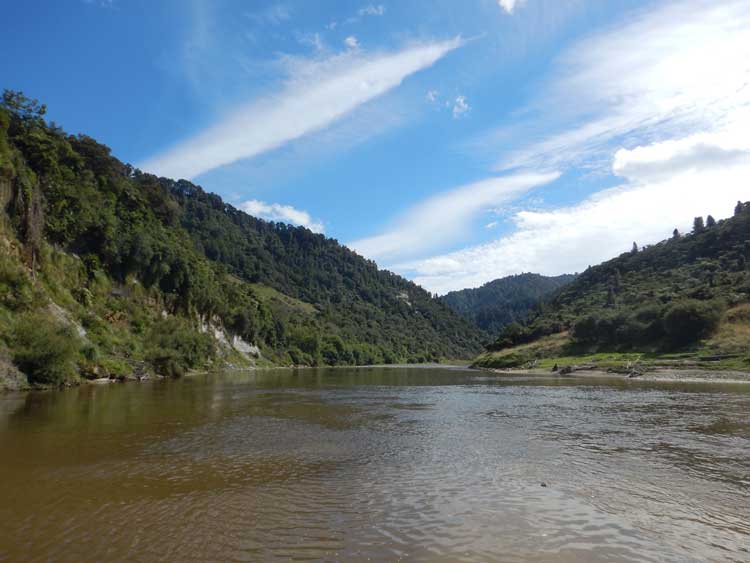 Whanganui from water: The Whanganui flows past as we prepare to paddle downstream. Photo by Alison Spencer