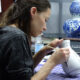 An artist at the Royal Delft Experience. Photo by Janna Graber